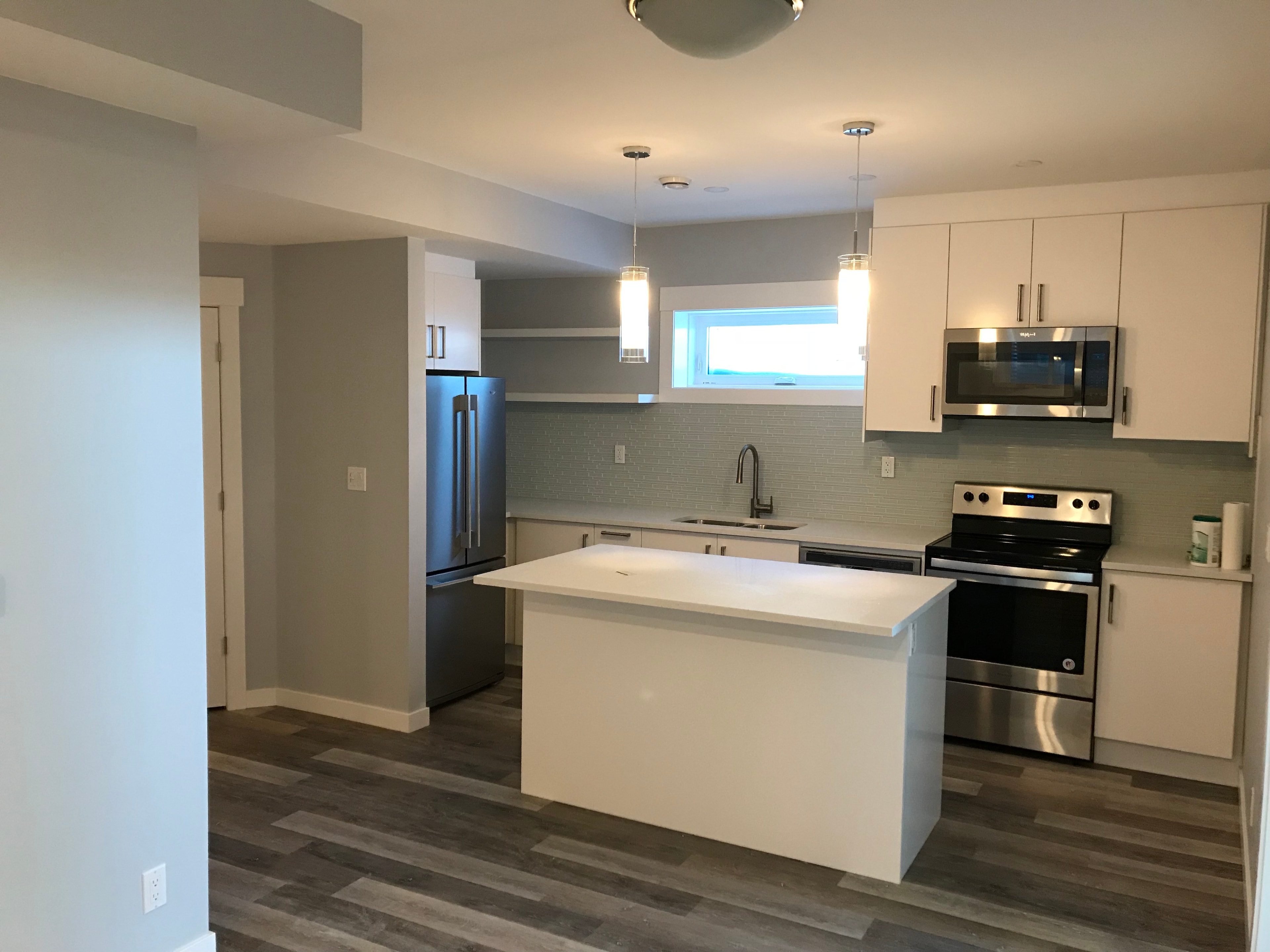 Finished basement renovation by Urban Square Developments in Airdrie