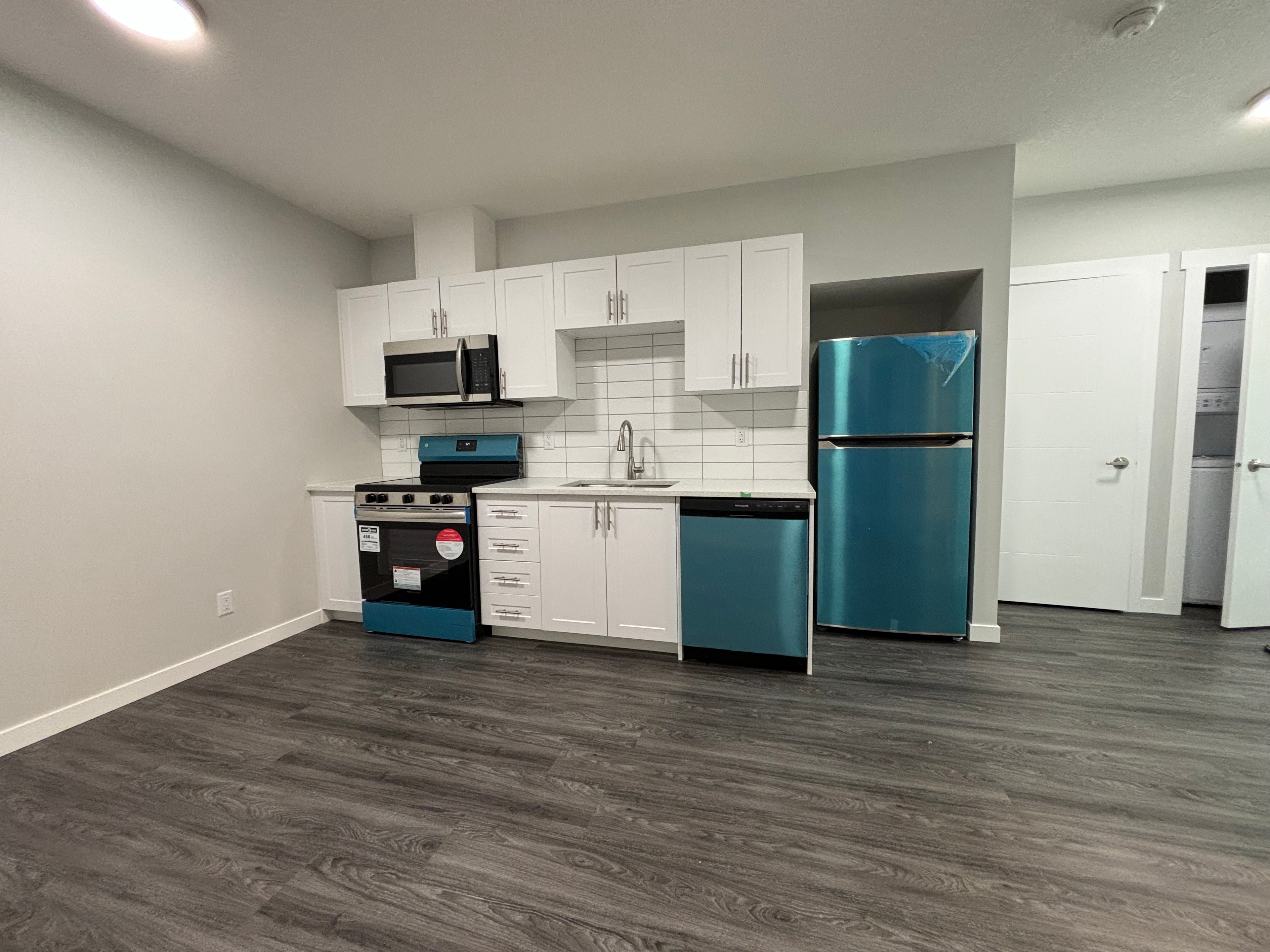 Finished secondary legal suite living room